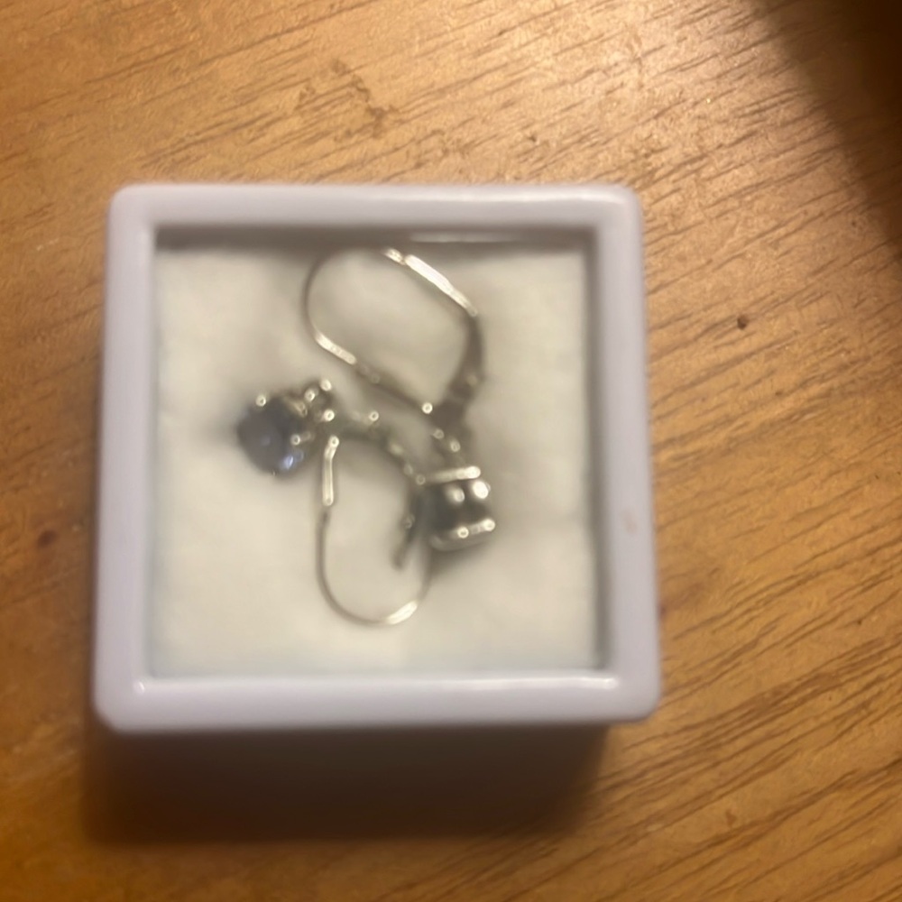 New, never worn 3.2 pariba topaz set in sterling silver.